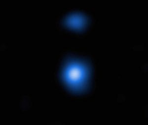 Le profil du nuage de gaz OBJ29323 détecté par Chandra dans le rayonnement X correspond à celui d’une « graine de trou noir supermassif », comme cela est prévu par les modèles. © Nasa, CXC, Scuola Normale Superiore, Pacucci
