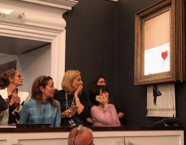 banksy vente aux encheres audo destruction oeuvre petite fille balon rouge coeur art