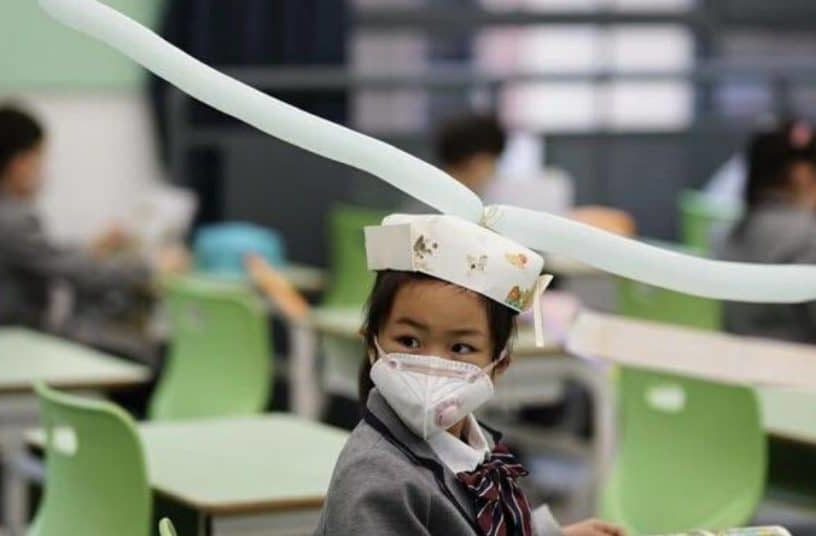 chapeau distanciation sociale chine écoles