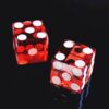 Deux dés symbolisant le risque dans les jeux d’argent.